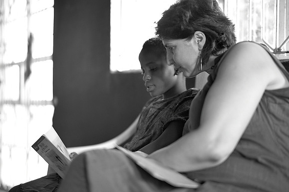 Helen reading with Mary