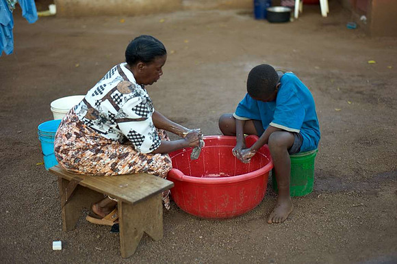 Bibi (grandma) & Edward washing up