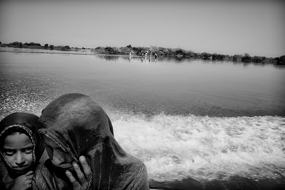 Some villagers return to their villages in an attempt to rebuild their houses and lives