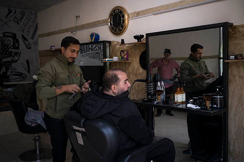 Barber shop, one of the very few still opened for business in Be