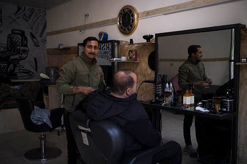 Barber shop, one of the very few still opened for business in Be