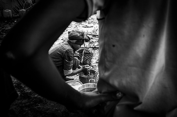 Trying to earn a small living at the Azati Kitli Mumbuk IDP site.