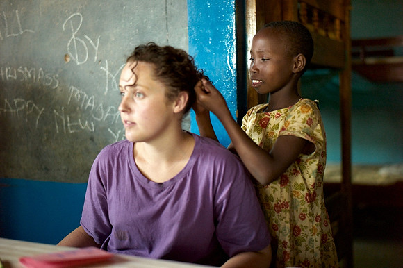 Upendo playing with Soph's hair