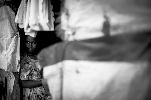The heat was stifling.  The town permeate with recurring stories of death, food and water shortages.